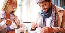 Two people at a cafe